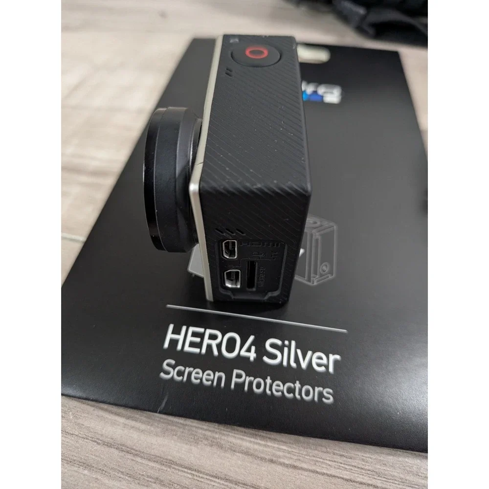 GoPro Hero 4 Silver Edition- with Accessories and Case Included